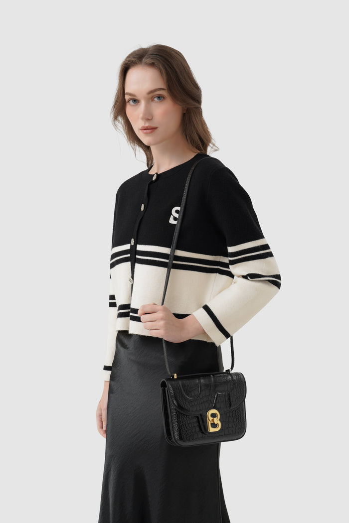 alba bag croco in black by buttonscarves worn as sling bag
