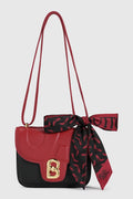 alba bag special edition shoulder bag in black/red by buttonscarves x the devil wears prada 2