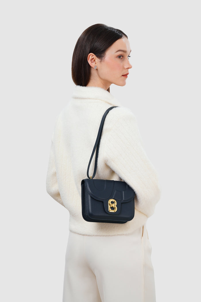 alba bag with sghw in blue reale by buttonscarves worn as shoulder bag