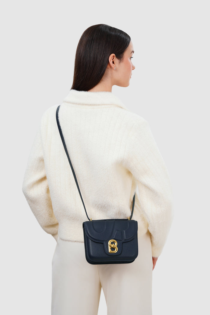 alba bag with sghw in blue reale by buttonscarves worn as sling bag