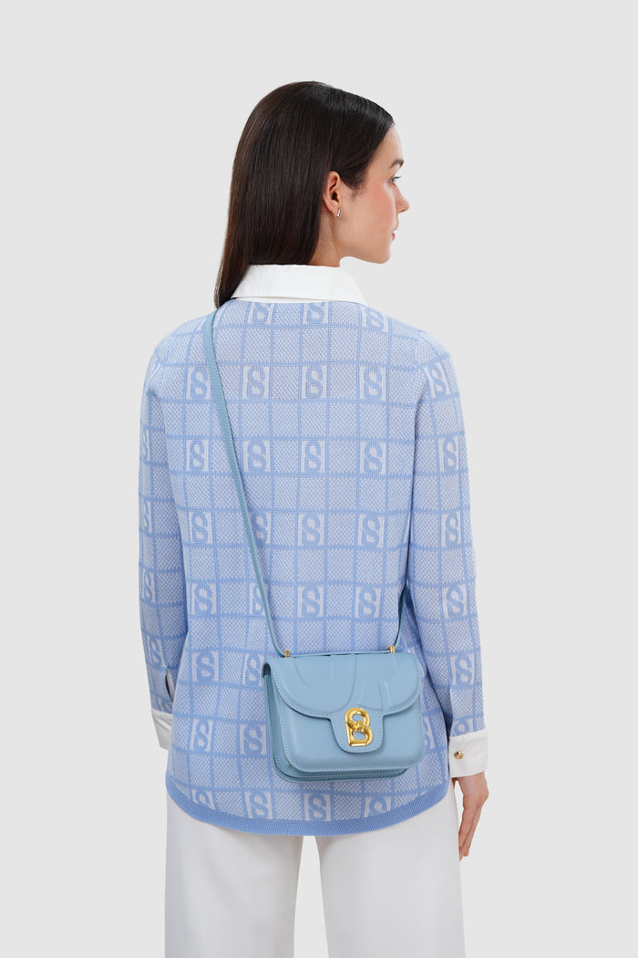 alba bag with sghw in cornflower by buttonscarves worn as sling bag