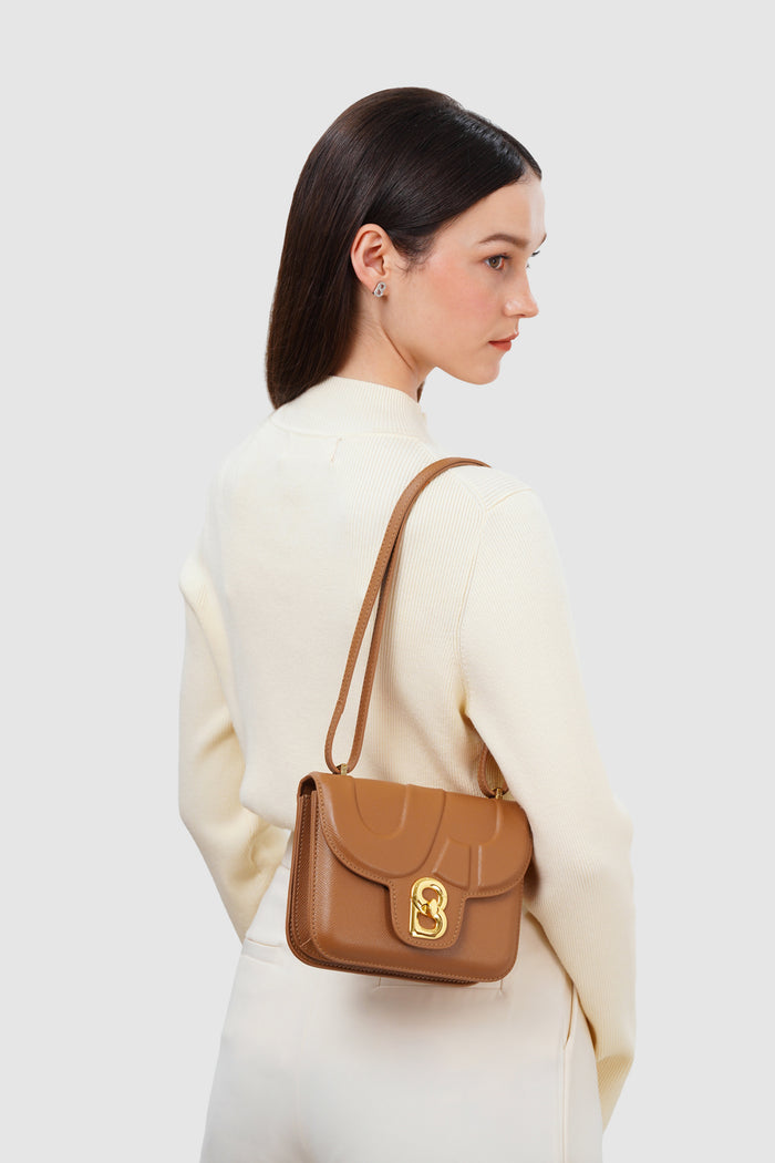 alba bag with sghw in flake by buttonscarves worn as shoulder bag