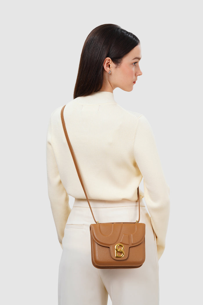 alba bag with sghw in flake by buttonscarves worn as sling bag