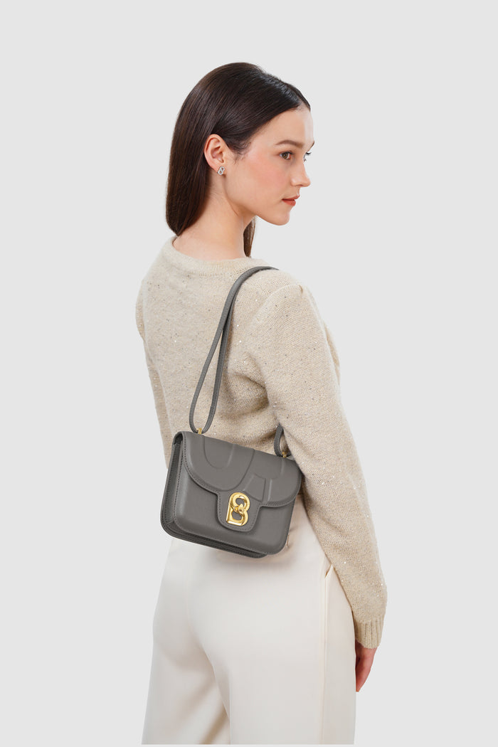 alba bag with sghw in fog by buttonscarves worn as shoulder bag
