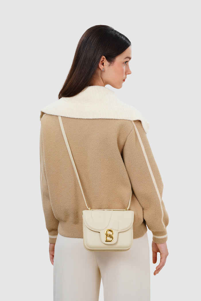 alba bag with sghw in lamb by buttonscarves worn as sling bag