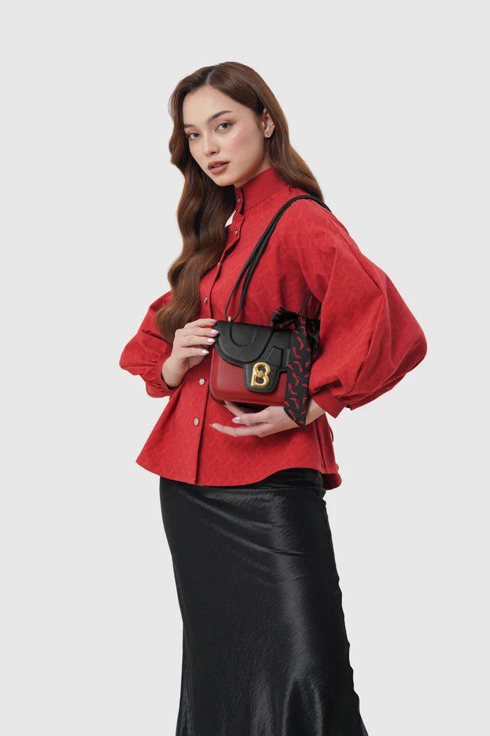 alba bag special edition shoulder bag in red/black by buttonscarves x the devil wears prada 2 carried on shoulder