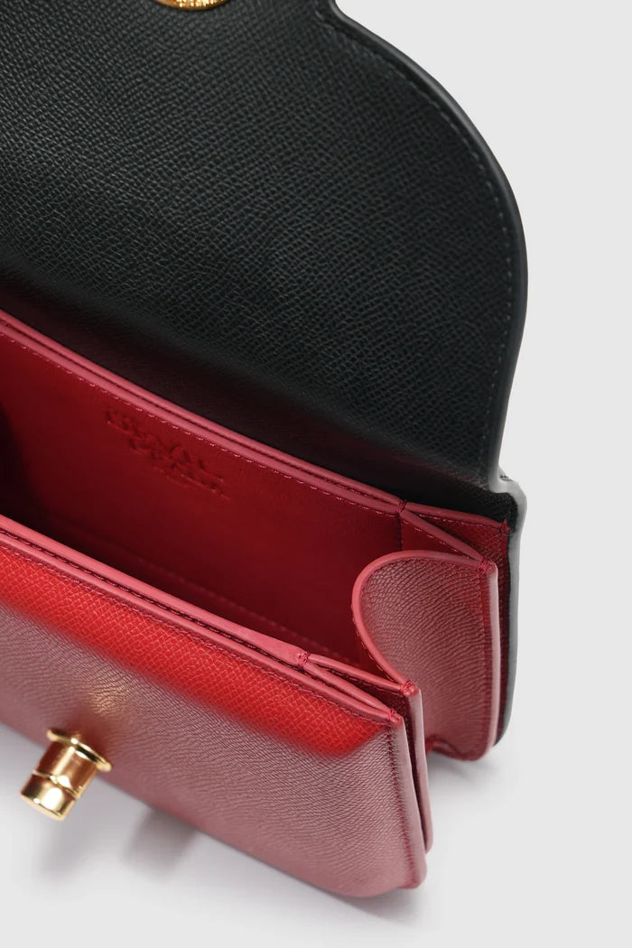 alba bag special edition shoulder bag in red/black by buttonscarves x the devil wears prada 2 interior