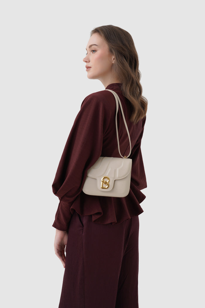 alba bag shiny leather in driftwood by buttonscarves worn as shoulder bag
