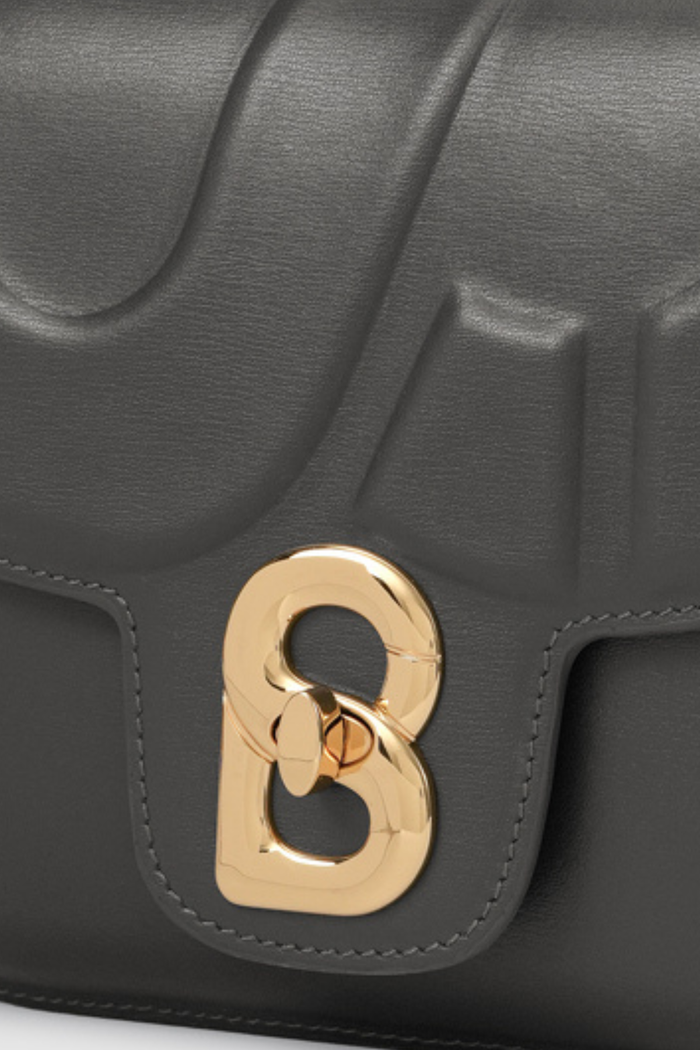 alba bag shiny leather in lava by buttonscarves signature b twist lock detail