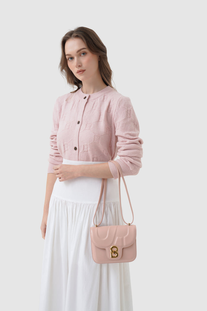 alba bag shiny leather in rosebud by buttonscarves carried on wrist