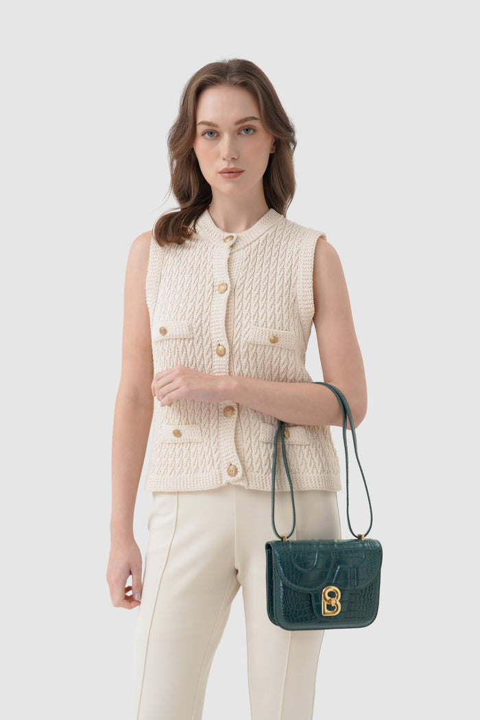 alba bag croco in teal by buttonscarves carried on wrist