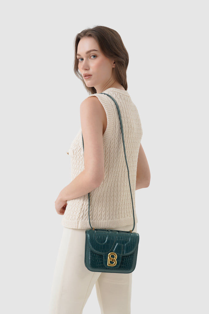 alba bag croco in teal by buttonscarves worn as sling bag