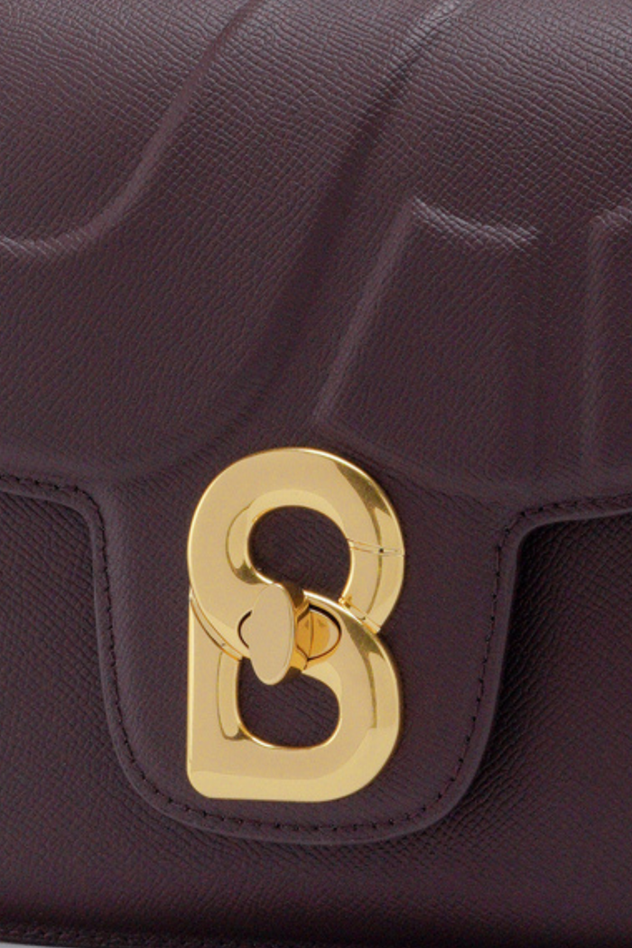 alba bag large in burgundy by buttonscarves signature b twist lock detail