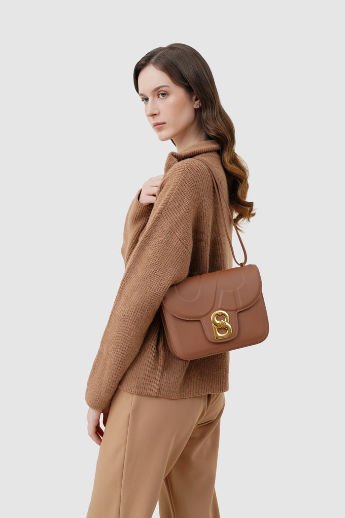 alba bag large in caramel by buttonscarves worn on shoulder