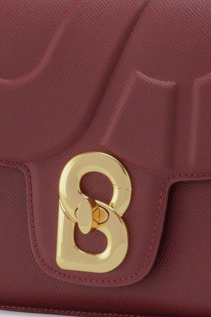 alba bag large in cremisi by buttonscarves signature b twist lock detail