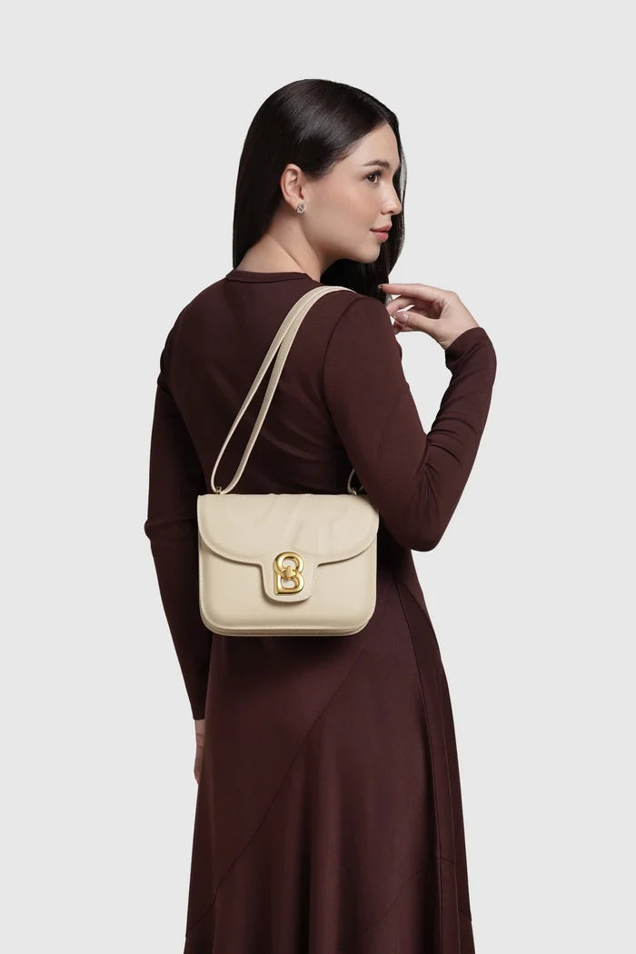 alba bag medium in chalk by buttonscarves worn on shoulder
