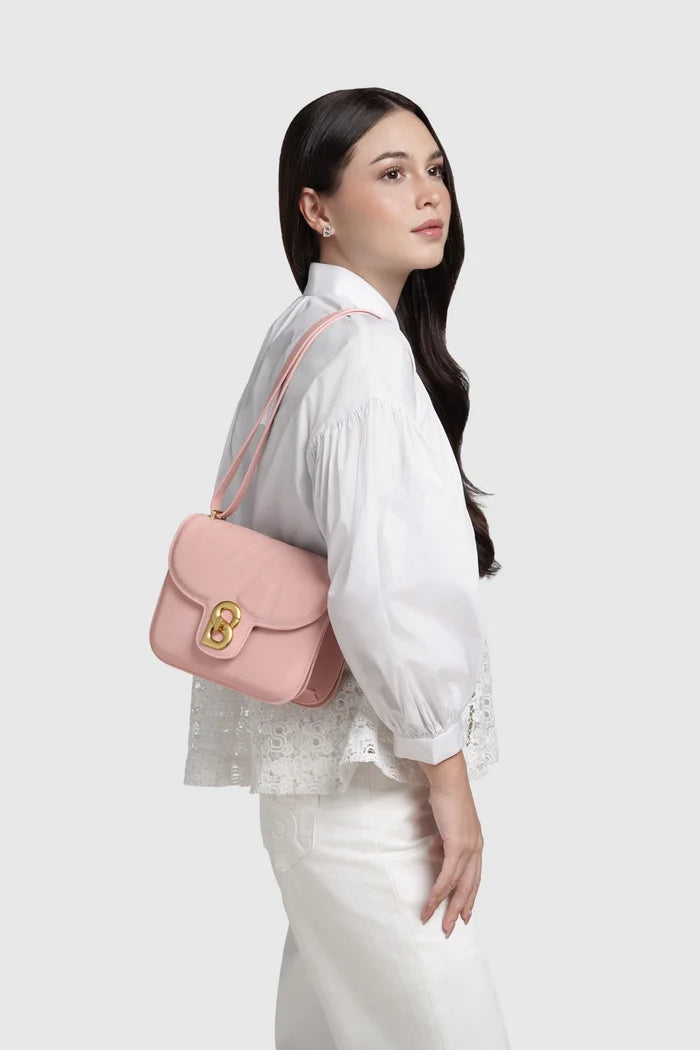 alba bag medium in dusty pink by buttonscarves worn on shoulder