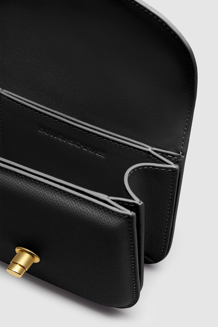 alba bag in black detailed view of textured saffiano cow leather