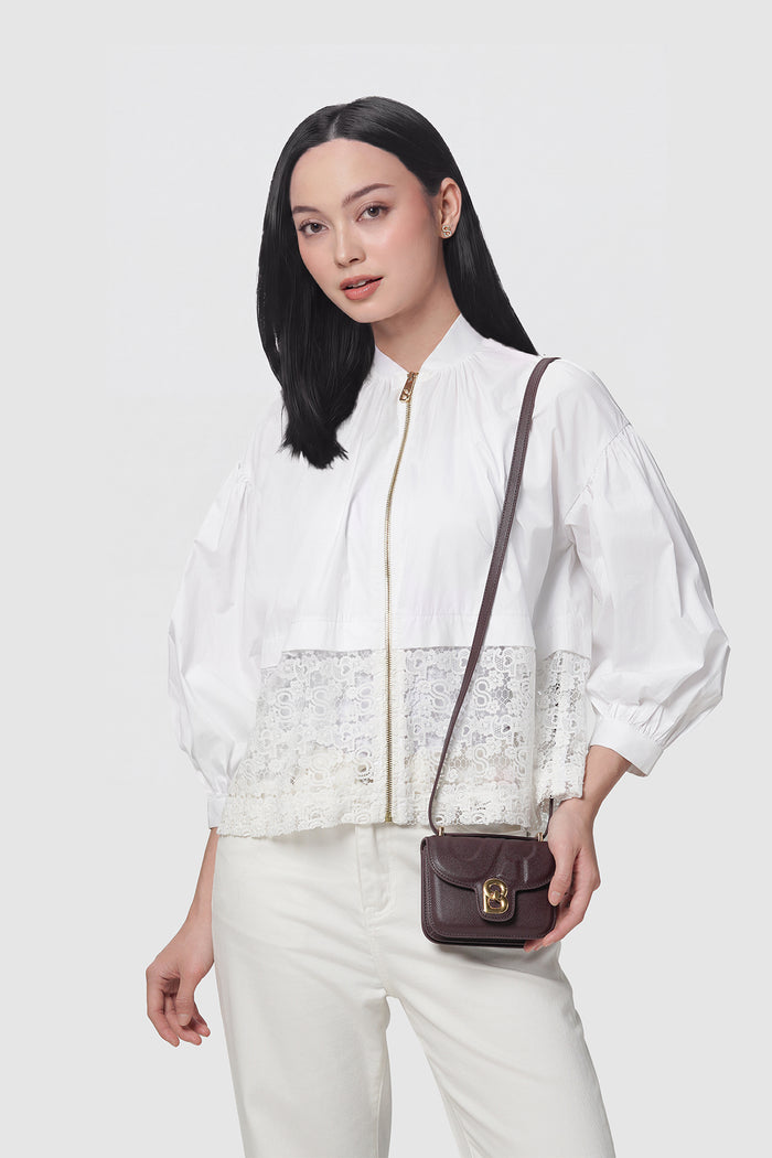 alba bag mini burgundy worn by a woman