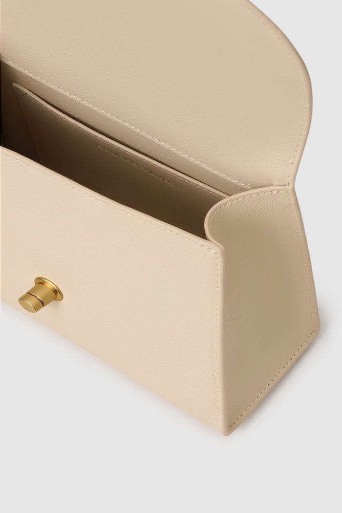 alda bag ivory sand detailed view of textured saffiano cow leather