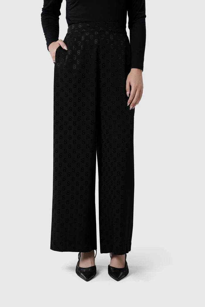 aleena pants in black by buttonscarves front view