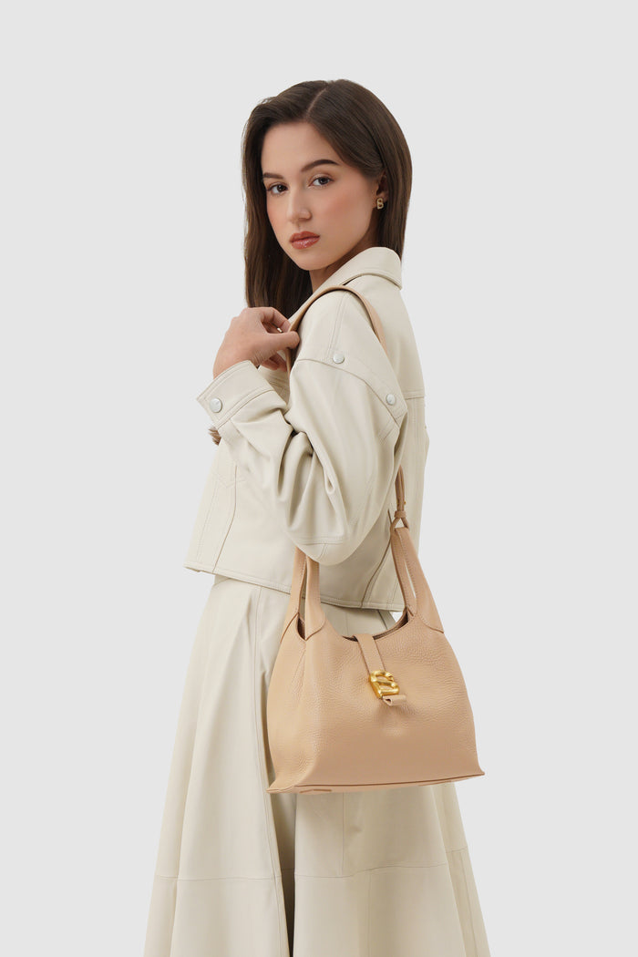 alexandra shoulder bag in champagne by buttonscarves carried on shoulder