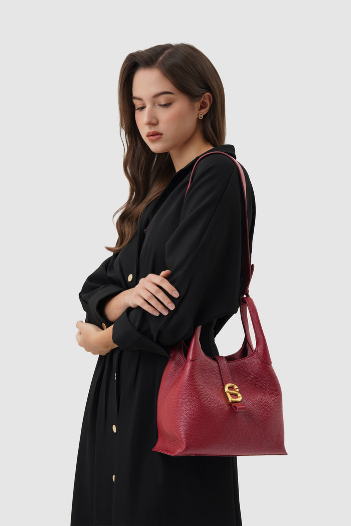 alexandra shoulder bag in cranberry by buttonscarves carried on shoulder