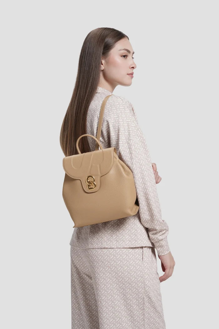 alma backpack in clay by buttonscarves worn on back