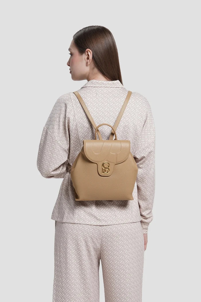 alma backpack in clay by buttonscarves worn on back