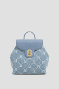 alma backpack in denim by buttonscarves
