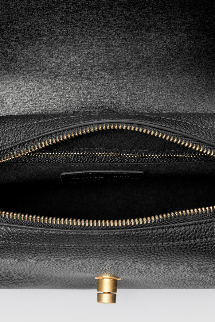 alma shoulder bag in black by buttonscarves interior compartment