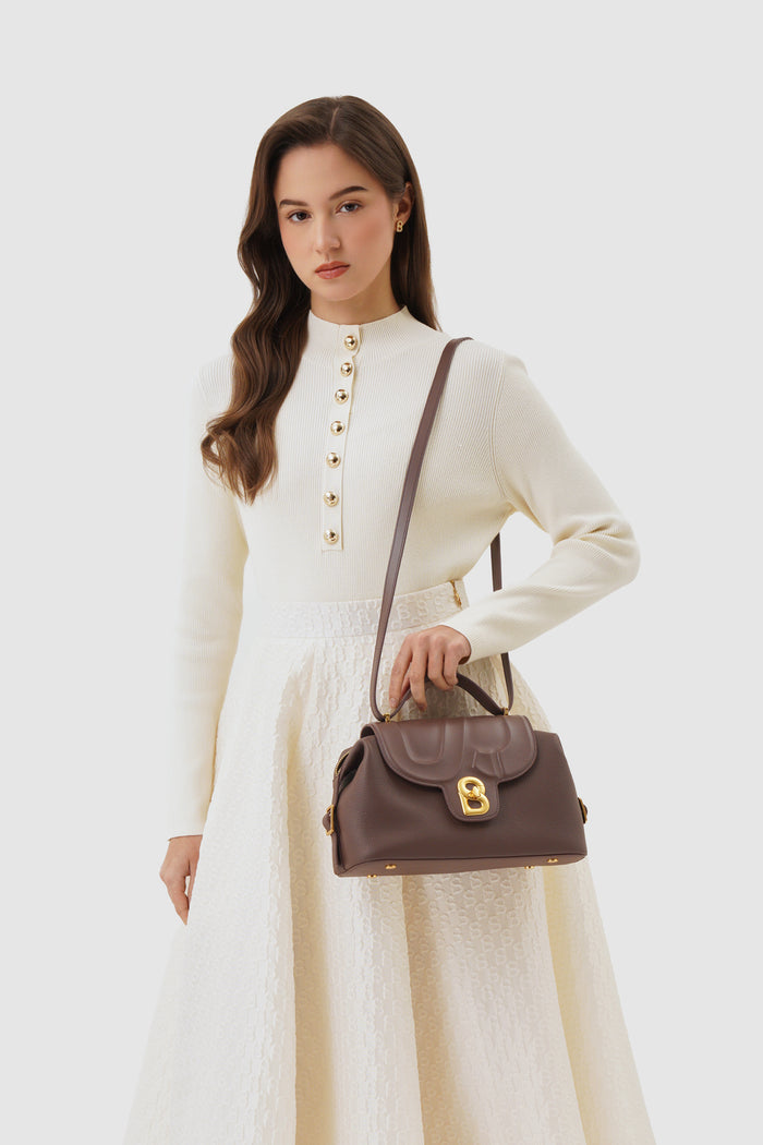 alma shoulder bag in brown by buttonscarves with adjustable strap