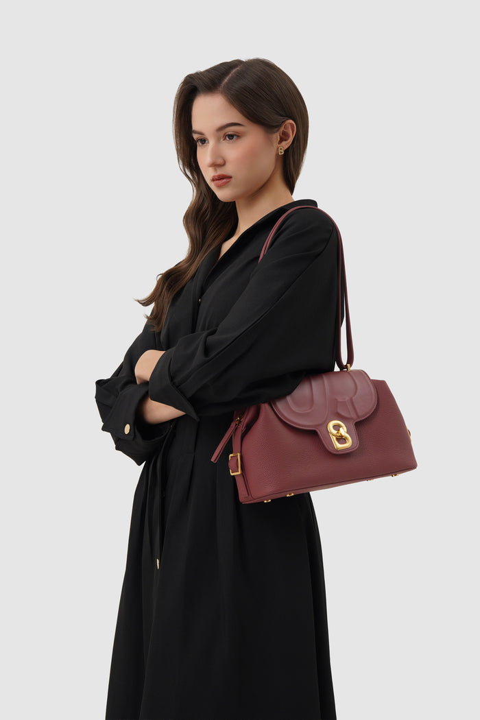 alma shoulder bag in cabernet by buttonscarves carried on shoulder