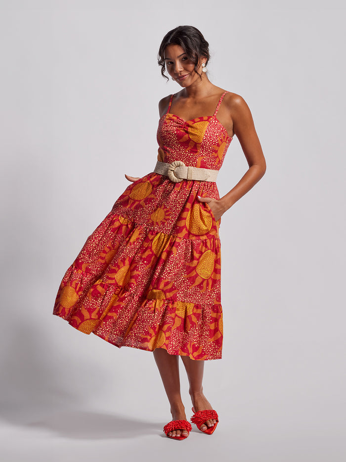 Red and yellow floral linen-cotton midi dress with beige belt, full and front-facing views.
