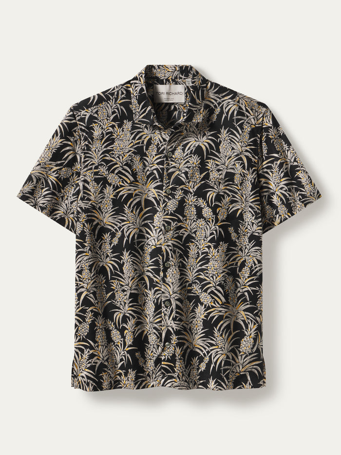Black cotton lawn shirt with beige & white tropical leaf and pineapple print, front view.