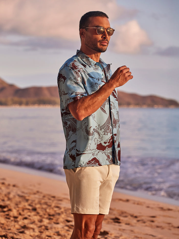 {{Blue silk short-sleeve shirt, sunglasses, sunset beach with Seto Inland Sea and mountains, front view}}{{/AltText}}.