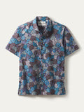 Blue, purple, and white abstract floral-print short-sleeve cotton shirt. Flat lay front view,
