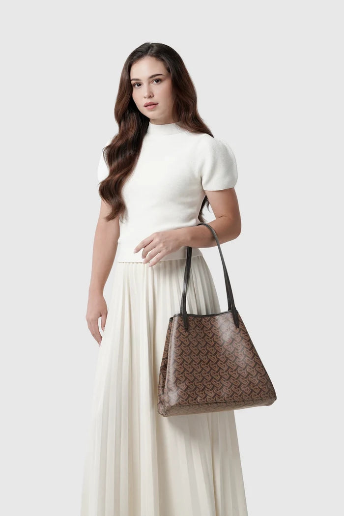 anya tote bag in brown by buttonscarves carried on wrist