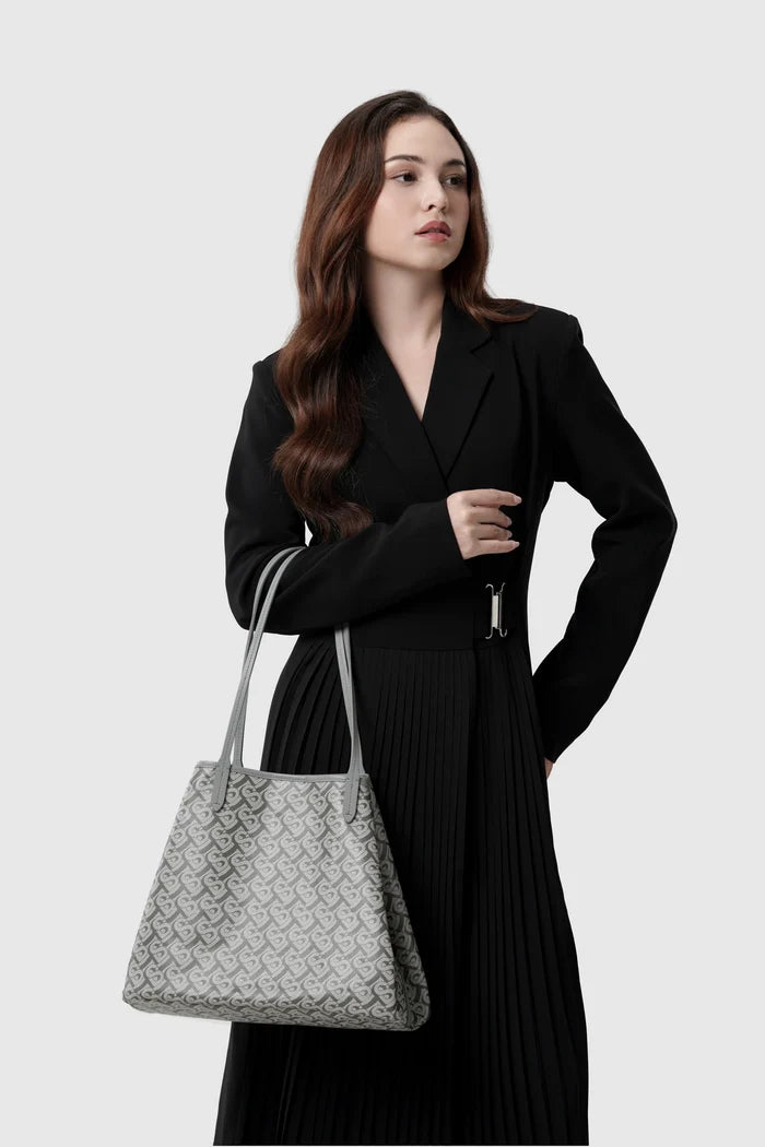 anya tote bag in grey by buttonscarves carried on wrist