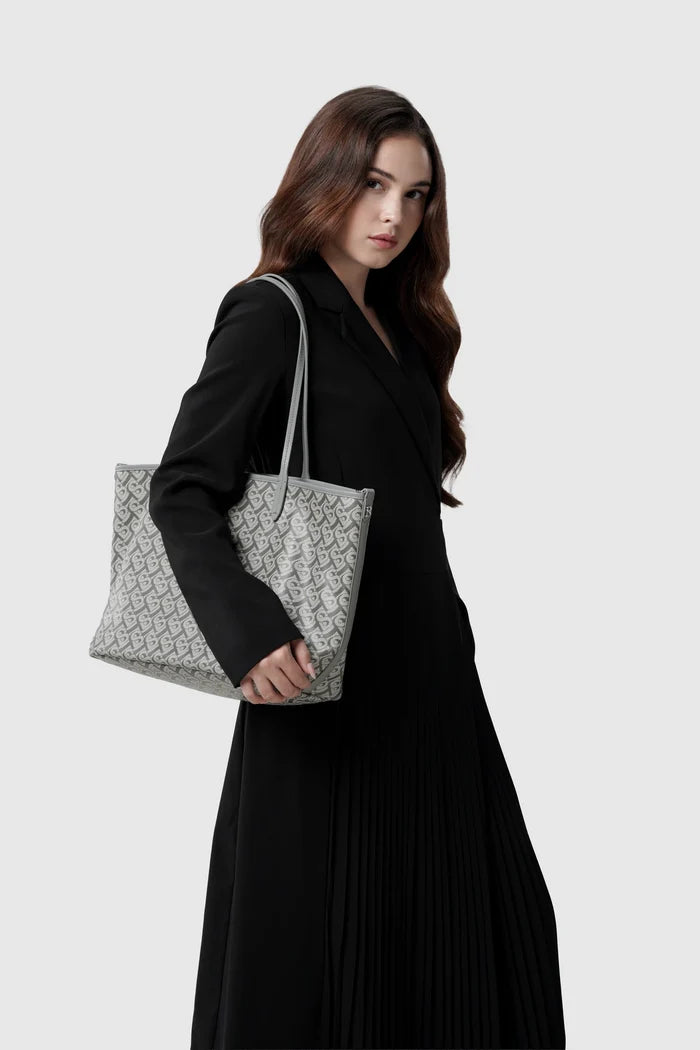 anya tote bag in grey by buttonscarves carried on shoulder