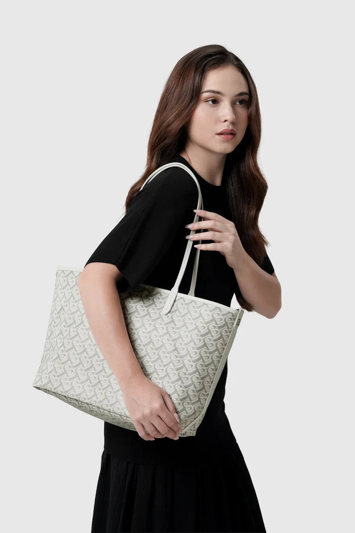 anya tote bag in white by buttonscarves carried on shoulder