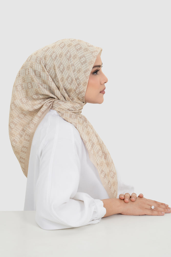 anyam printed square scarf in bleached sand by buttonscarves side view
