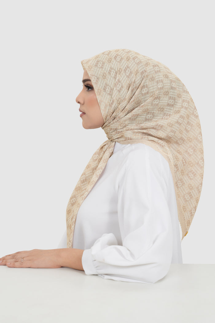 anyam printed square scarf in bleached sand by buttonscarves side view