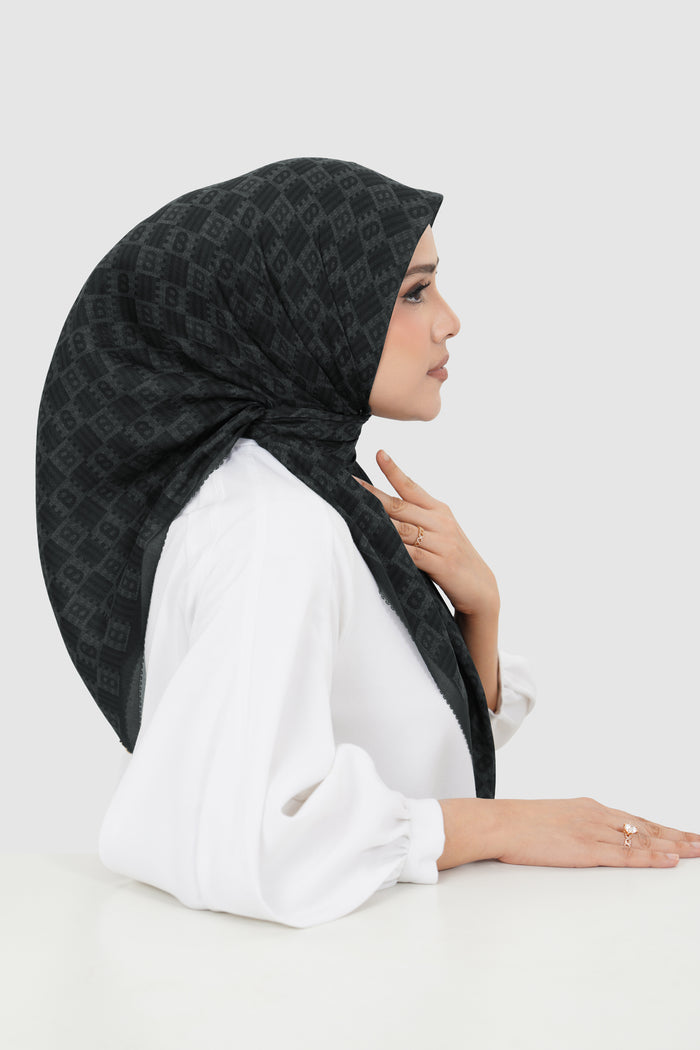 anyam printed square scarf in pirate black by buttonscarves side view