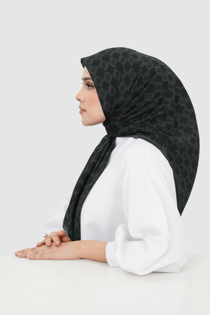 anyam printed square scarf in pirate black by buttonscarves side view