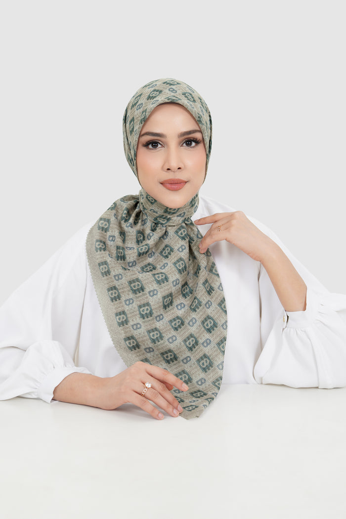 anyam printed square scarf in plaza taupe by buttonscarves front view