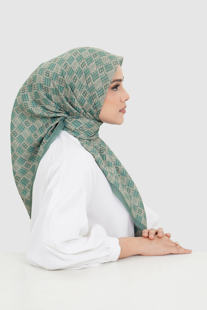 anyam printed square scarf in stormy sea by buttonscarves side view