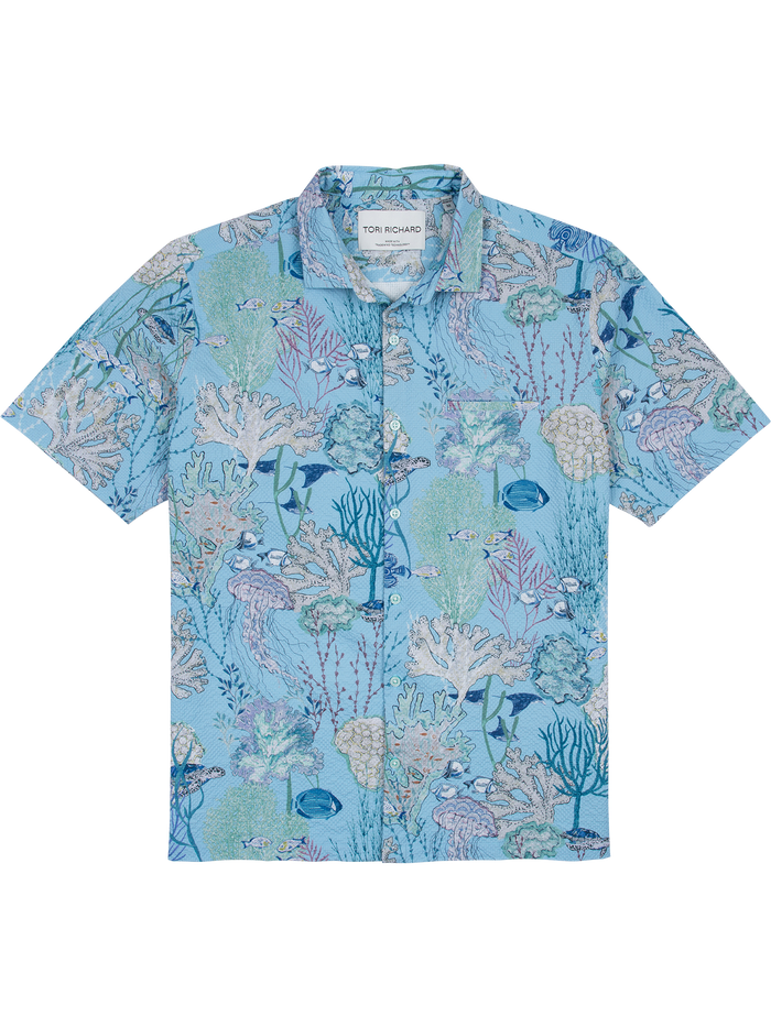 Light blue sea life cooling shirt with UPF; front views show sun-protective pattern.