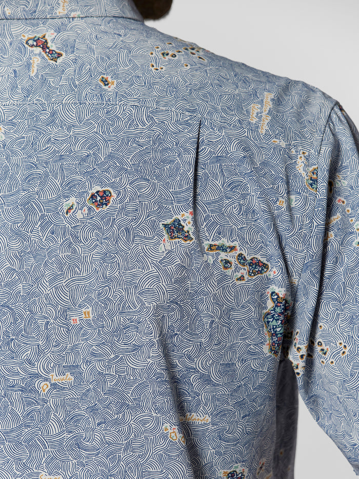 Blue abstract wave and floral-print short-sleeve shirt, back and shoulder close-up shown in both images.