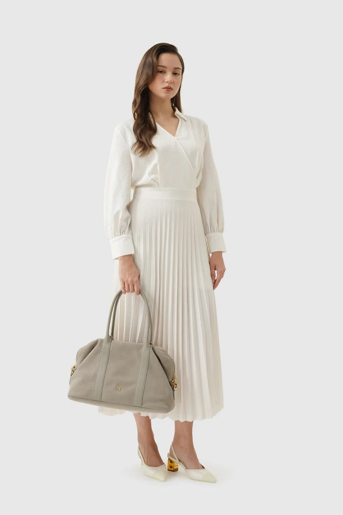 aveline bag in grey by buttonscarves carried by hand